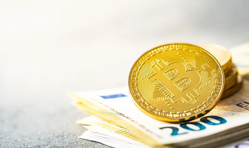 euro-banknotes-and-bitcoins-coins-of-cryptocurren-2025-03-13-02-36-05-utc